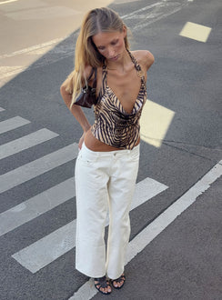 Crafted from premium denim, Ellanor Low Rise Straight Leg Jeans White Petite in womens-jeans with low-rise waist front view of model wearing Princess Polly