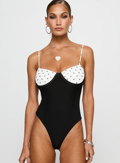 front view of model wearing Princess Polly Evette Bodysuit Black / White Sleeveless Bodysuit 