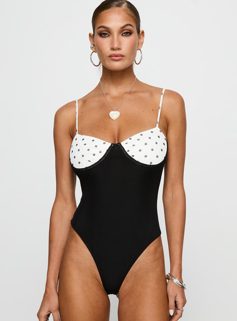 front view of model wearing Princess Polly Evette Bodysuit Black / White Sleeveless Bodysuit 