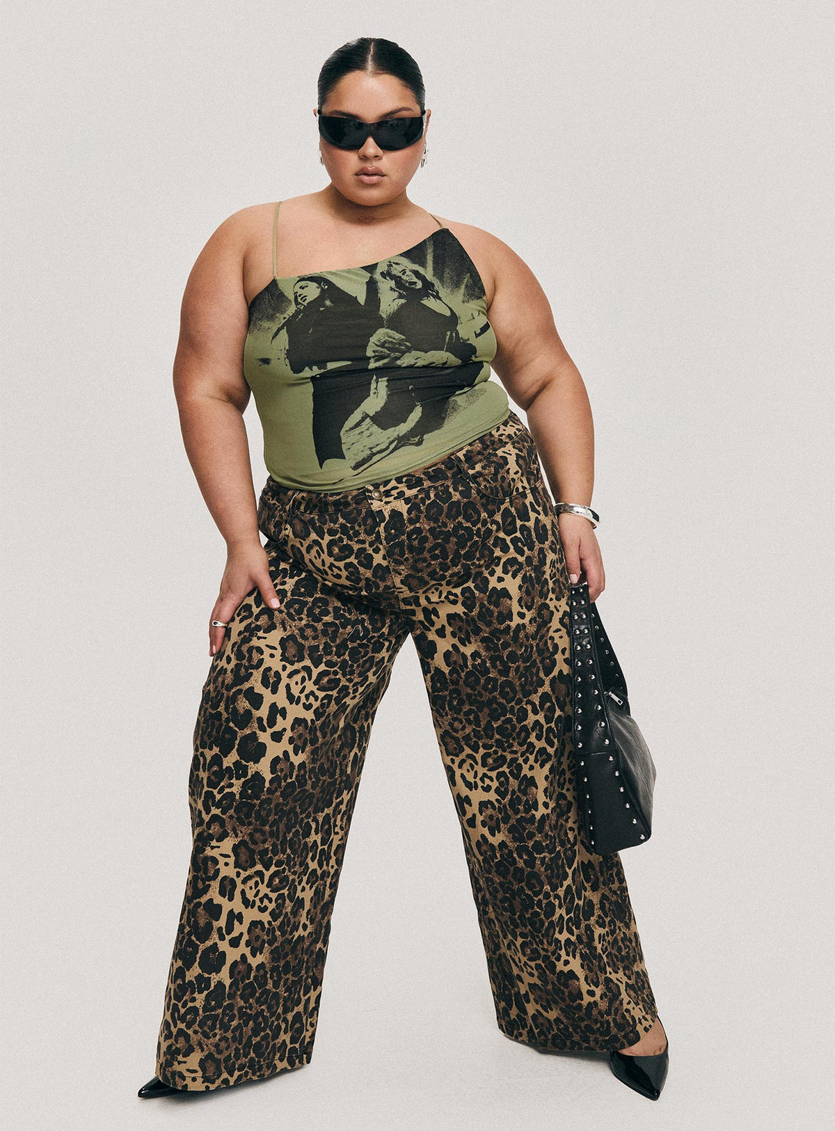 front view of model wearing Princess Polly Pantar Low Rise Pants Leopard Curve Low Rise Pants Pants 