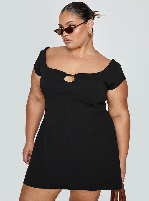 side view of model wearing Princess Polly Sylvette Mini Dress Black Curve Scoop Neck 