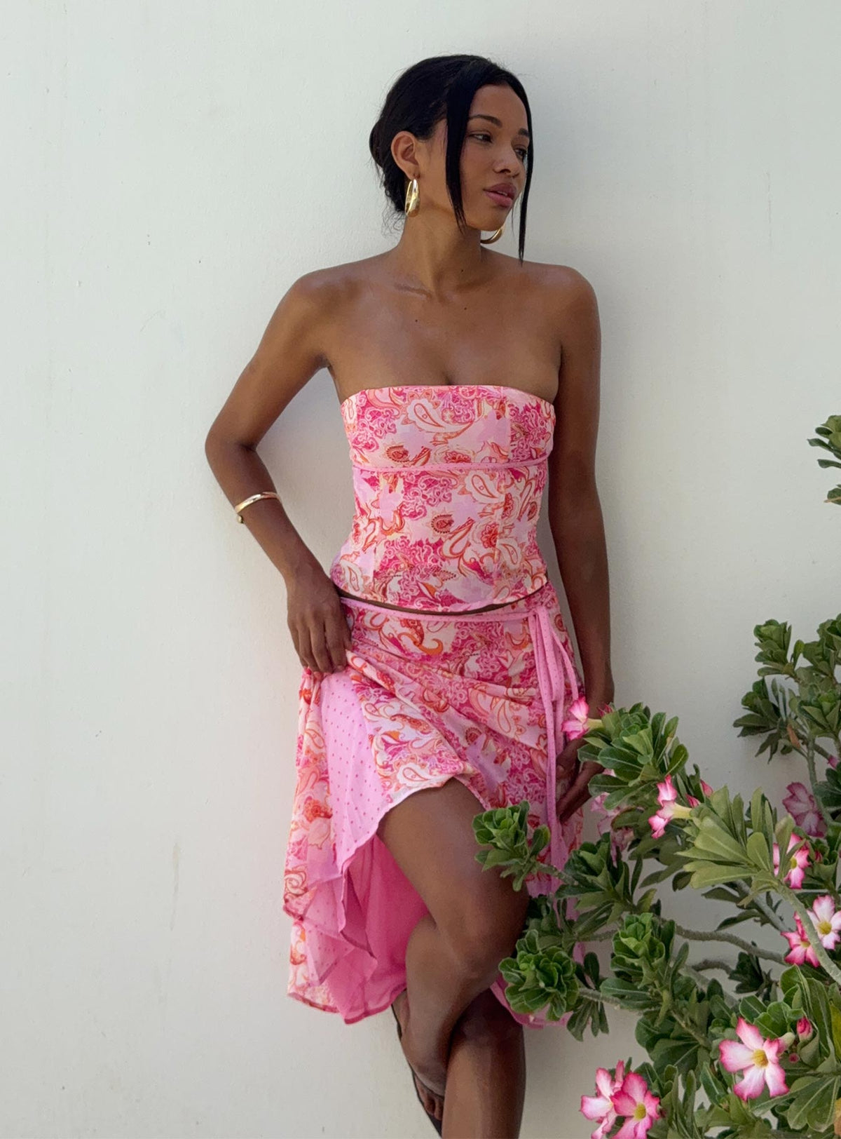back view of model wearing Princess Polly Tipsy Midi Skirt Pink Paisley Midi Skirts Skirts 