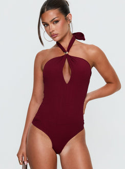 front view of model wearing Princess Polly Bridey Cut Out Bodysuit Red Sleeveless Bodysuit 