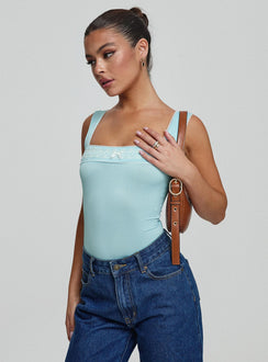 front view of model wearing Princess Polly Keating Bodysuit Baby Blue Sleeveless Bodysuit 