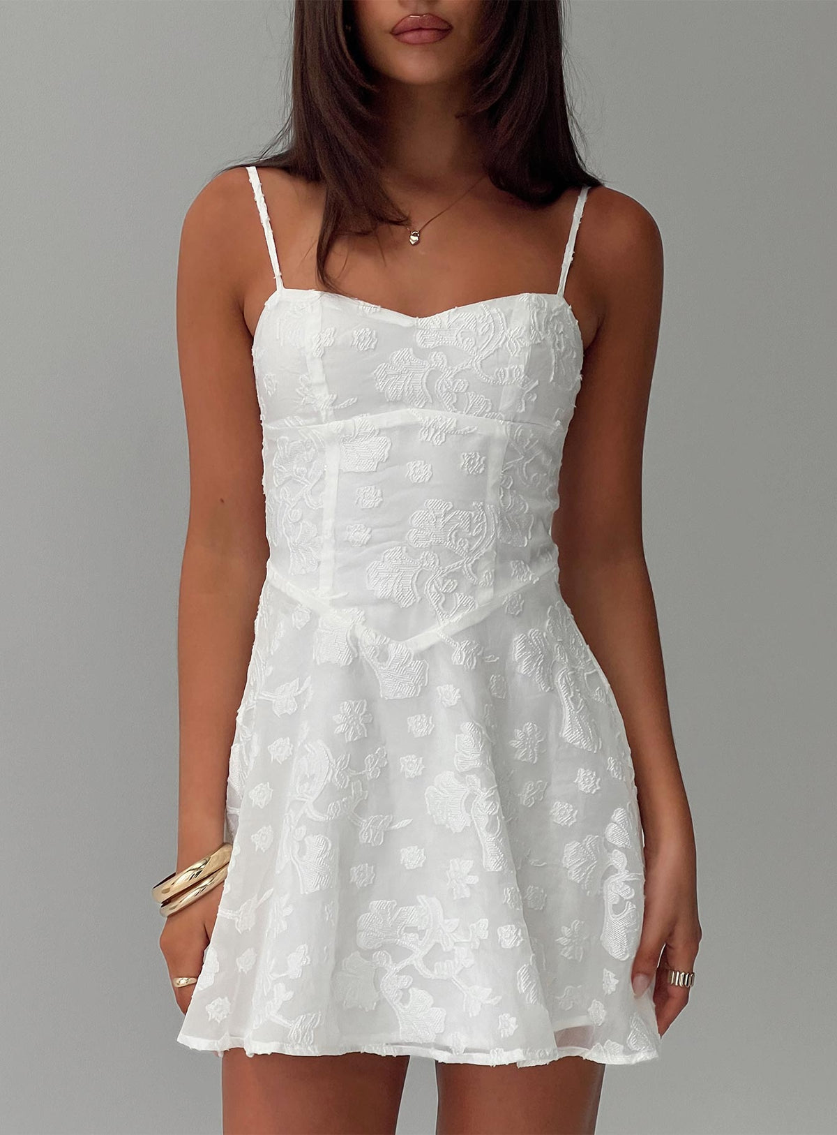 front view of model wearing Princess Polly New Chapters Broderie Mini Dress White Sweetheart Neckline 