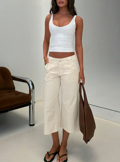Crafted from quality fabric, the Miska Wide Leg Capri Pants Off White in womens-regular-pants with mid-rise waist detail view of model wearing Princess Polly