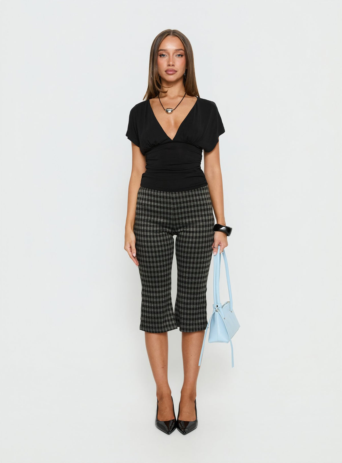 front view of model wearing Princess Polly Lights Are Off Capri Pants Multi Mid Rise Pants Pants 