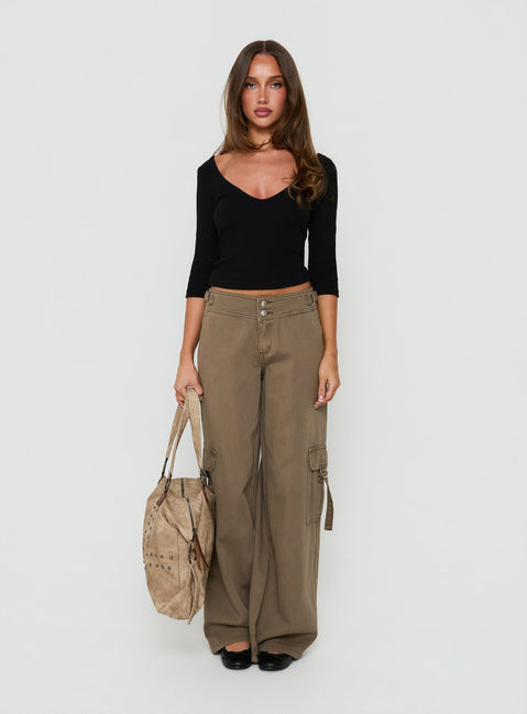 Designed with Kellenna Straight Leg Low Rise Cargo Pants Khaki in dark khaki with a belt and low-rise detail front view of model wearing Princess Polly