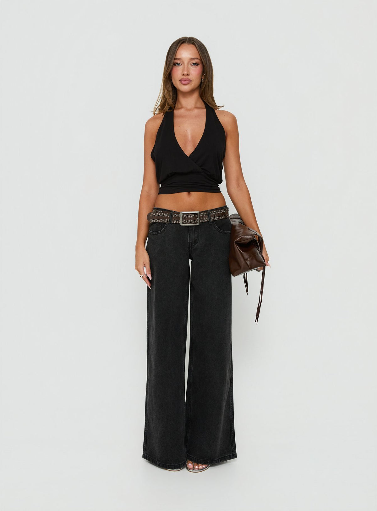Showcasing the Picco Ultra Low Rise Wide Leg Jeans Washed Black in womens-jeans front view of model wearing