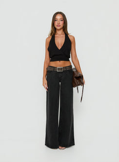 Showcasing the Picco Ultra Low Rise Wide Leg Jeans Washed Black in womens-jeans front view of model wearing
