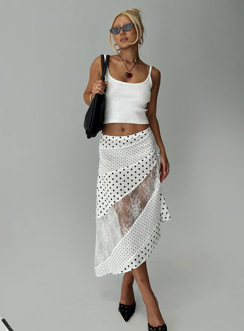   side view of model wearing Princess Polly Rennar Maxi Skirt White / Polka Dot Petite Midi Skirts Skirts 