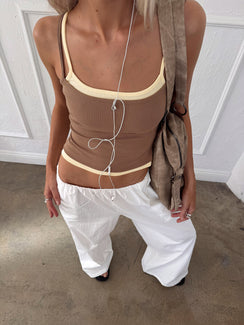 Showcasing the Lunea Concealed Waistband Pants White Petite in womens regular pants with high-rise wide-leg design front view of model wearing