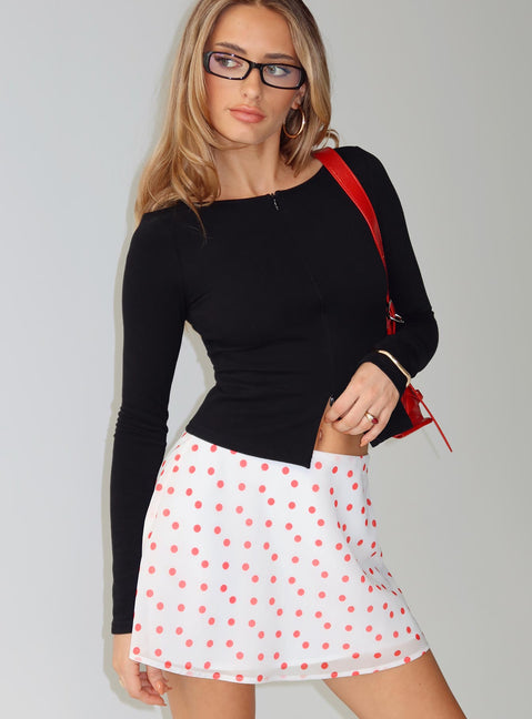   side view of model wearing Princess Polly Dapple Bias Mini Skirt White / Red Polka Mini Skirts Skirts 