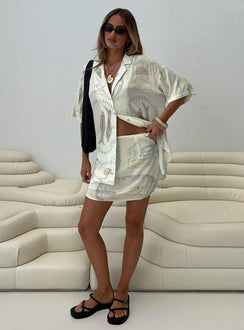  front view of model wearing Princess Polly Caraliia Mini Skirt Cream Mini Skirts Skirts 