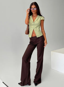 side view of model wearing Princess Polly Kinkirk Flared Pants Brown Pinstripe Low Rise Pants Pants 
