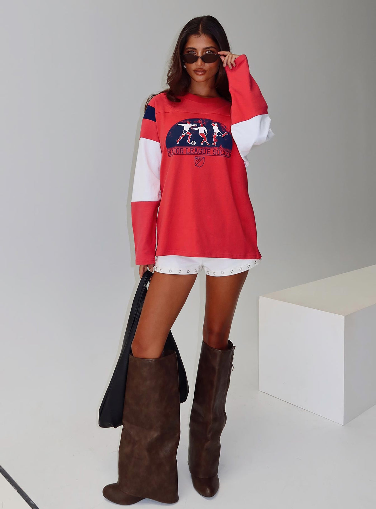 front view of model wearing Princess Polly MLS 96 Retro Long Sleeve Top Red Full Sleeves Crew Neck 