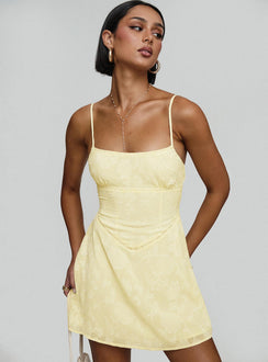 front view of model wearing Princess Polly South Of France Mini Dress Yellow Petite Square Neck 