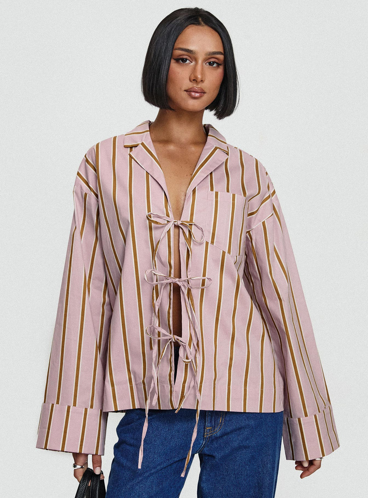 front view of model wearing Princess Polly Spiri Shirt Pink Stripe Full Sleeves V-Neck 