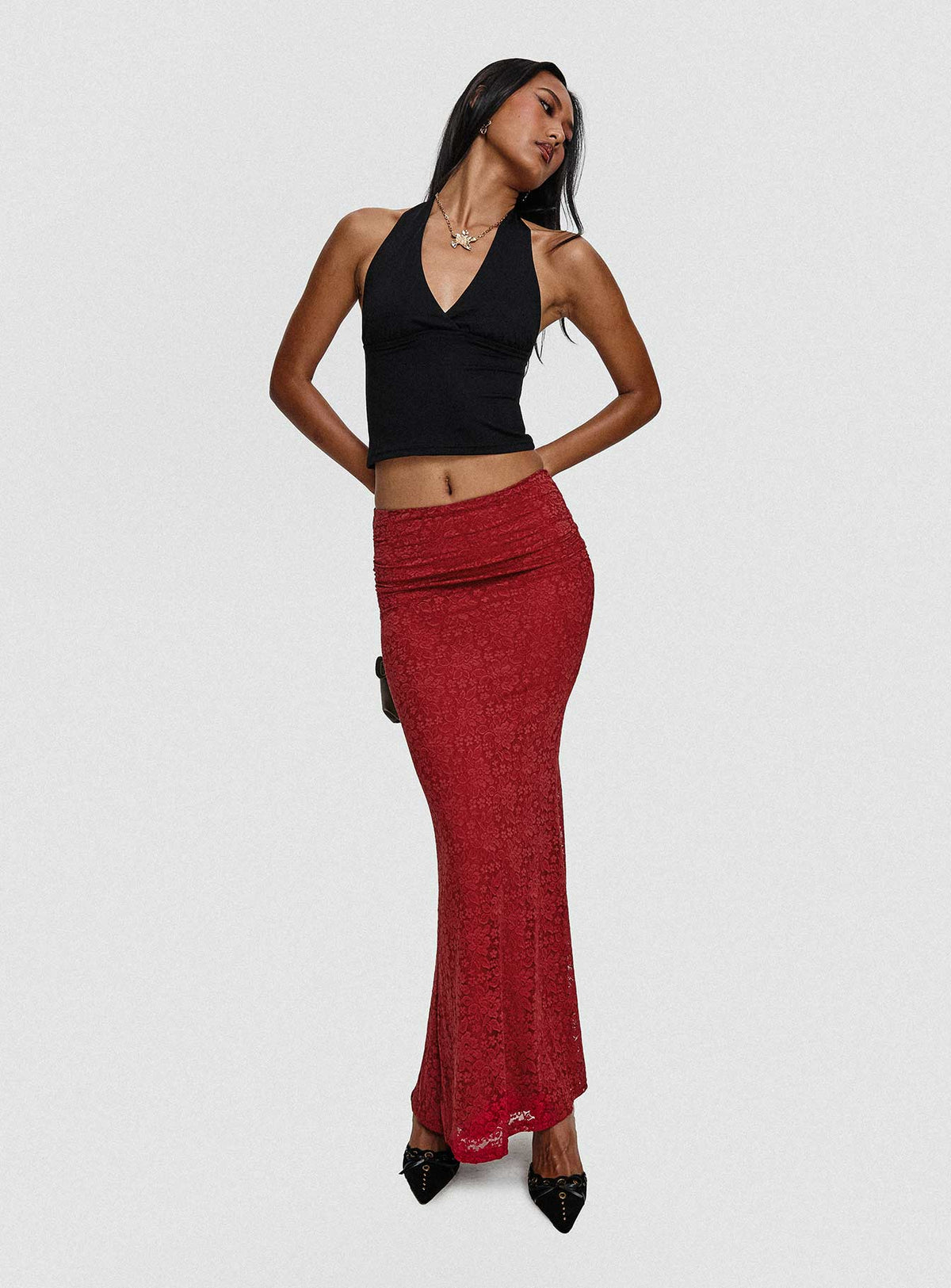   side view of model wearing Princess Polly Silene Maxi Skirt Red Skirts 