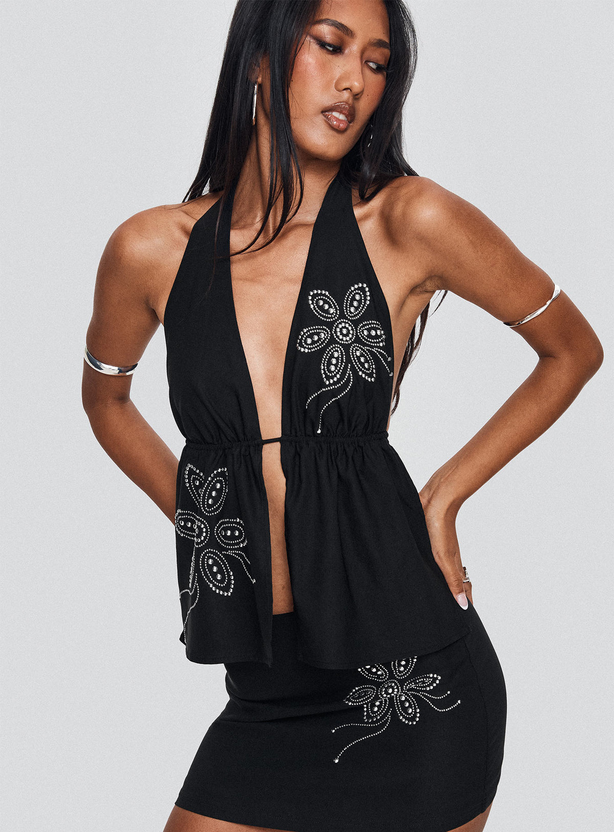 front view of model wearing Princess Polly Quotation Diamante Halter Backless Top Black Sleeveless Plunger 