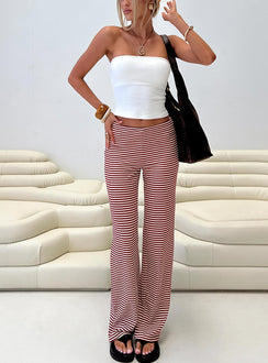 front view of model wearing Princess Polly Next To Me Lounge Pant Red / White Stripe Low Rise Pants Pants 