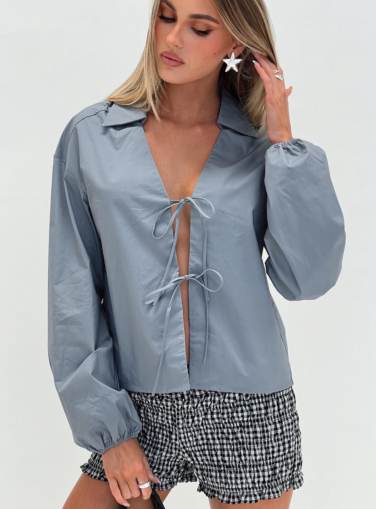 front view of model wearing Princess Polly Rinon Long Sleeve Top Steel Full Sleeves V-Neck 