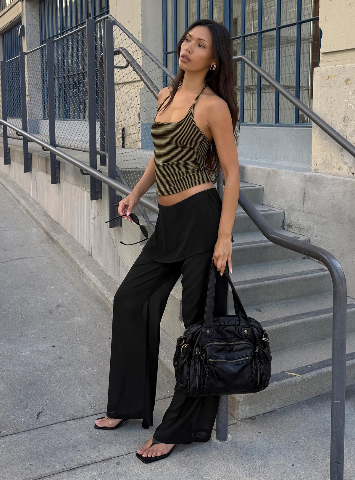 side view of model wearing Princess Polly Jaedon Chiffon Layered Pants Black Mid Rise Pants Pants 