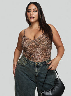 side view of model wearing Princess Polly Elixia Bodysuit Leopard Curve Sleeveless Bodysuit 