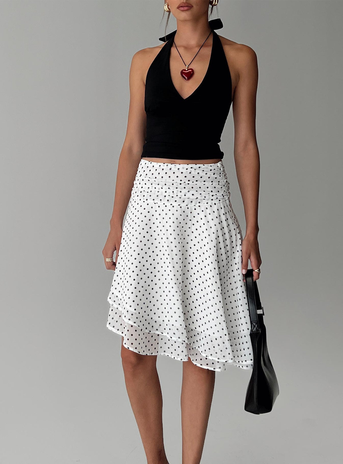   front view of model wearing Princess Polly Evanescence Asymmetrical Midi Skirt White / Polka Dot Midi Skirts 