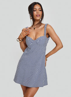 side view of model wearing Princess Polly Mcbeath Mini Dress Navy Check Sweetheart Neckline 