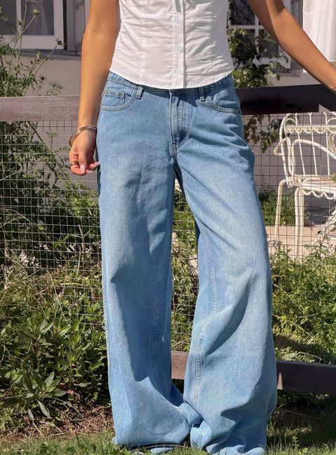 Featuring the Ramos Low Rise Denim Jeans Bright Blue Wash Petite in womens-jeans with low-rise waist detail