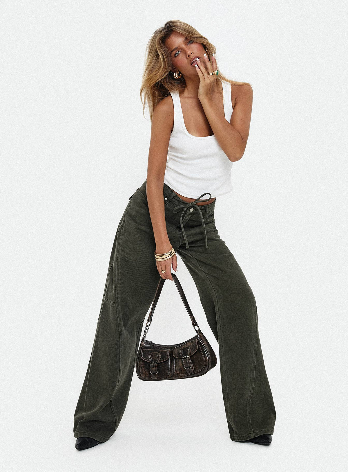 front view of model wearing Princess Polly Bruiser Tie Waist Mid Rise Wide Leg Jeans Green High Rise Jeans Jeans 
