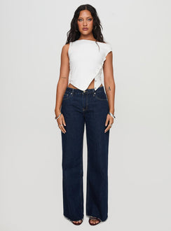 side view of model wearing Princess Polly Darla Low Rise Straight Jean Dark Wash Petite Low Rise Jeans 