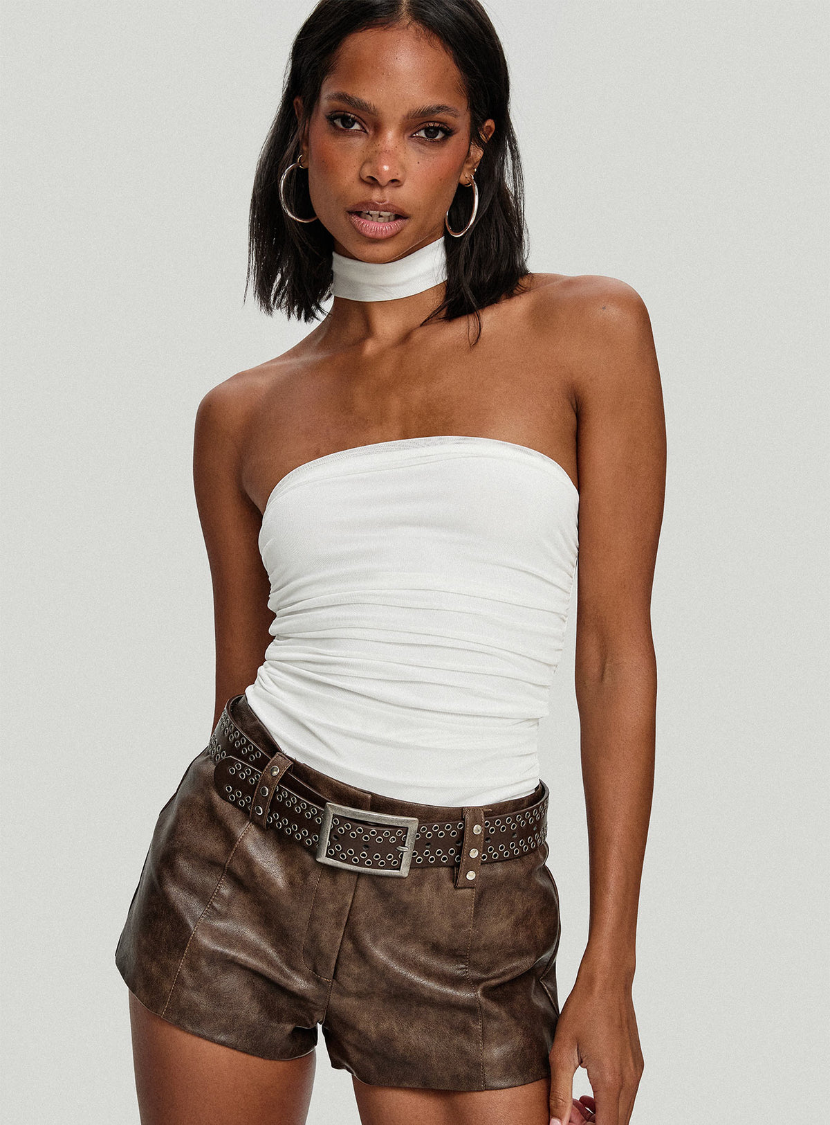 side view of model wearing Princess Polly Sorelle Scarf Bodysuit White Sleeveless Bodysuit 