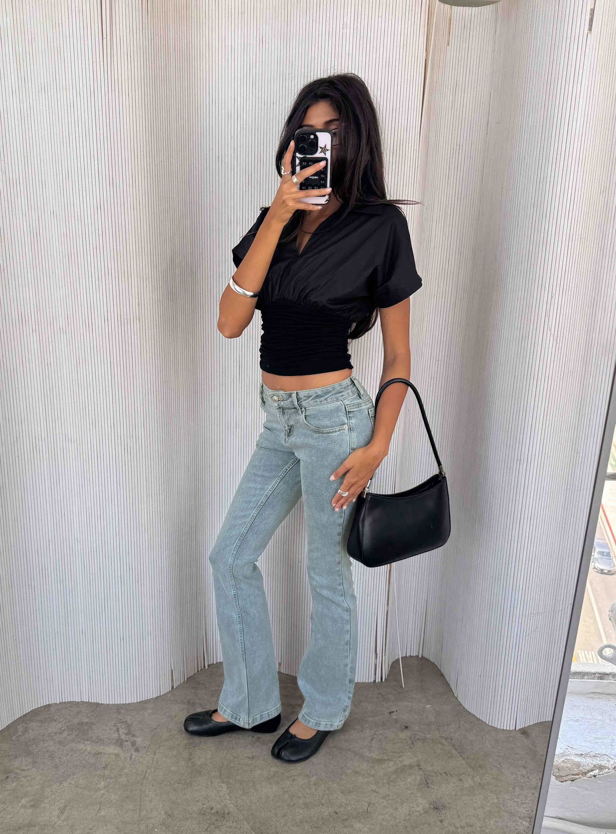 Crafted from Bethany Low Rise Bootleg Jeans Ice Wash womens-jeans with low-rise detail view of model wearing
