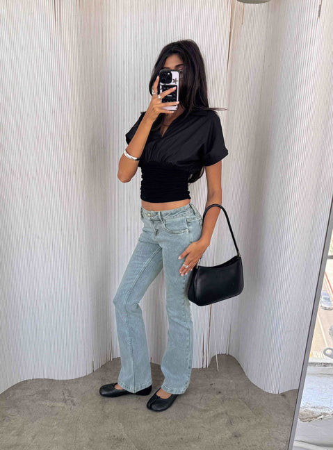 Crafted from Bethany Low Rise Bootleg Jeans Ice Wash womens-jeans with low-rise detail view of model wearing