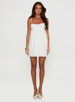 front view of model wearing Princess Polly Marliene Broiderie Mini Dress White Sweetheart Neckline 