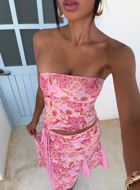   side view of model wearing Princess Polly Tipsy Midi Skirt Pink Paisley Midi Skirts Skirts 