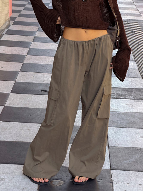 Showcasing Lunea Concealed Waistband Cargo Pants Charcoal womens-regular-pants with mid-rise front view of model wearing Princess Polly