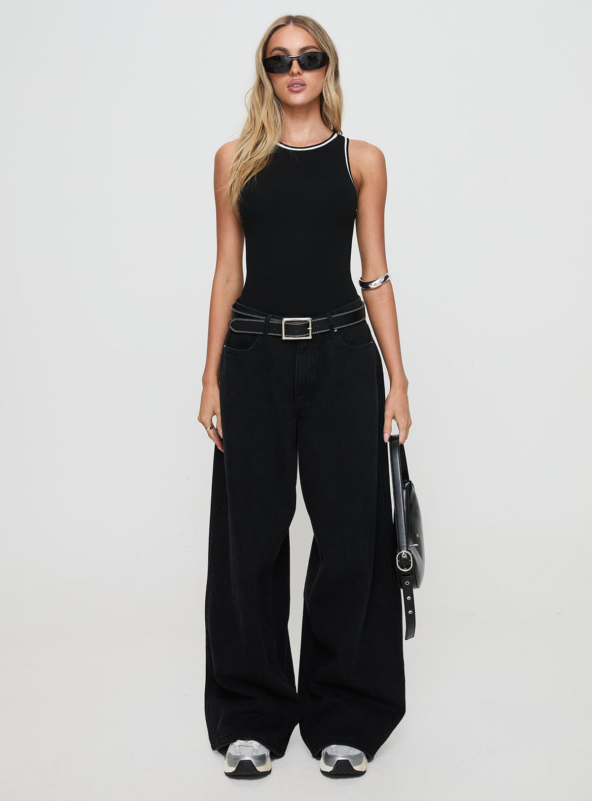 front view of model wearing Princess Polly Pietra Bodysuit Black Sleeveless Bodysuit 