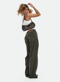 side view of model wearing Princess Polly Bruiser Tie Waist Mid Rise Wide Leg Jeans Green High Rise Jeans Jeans 