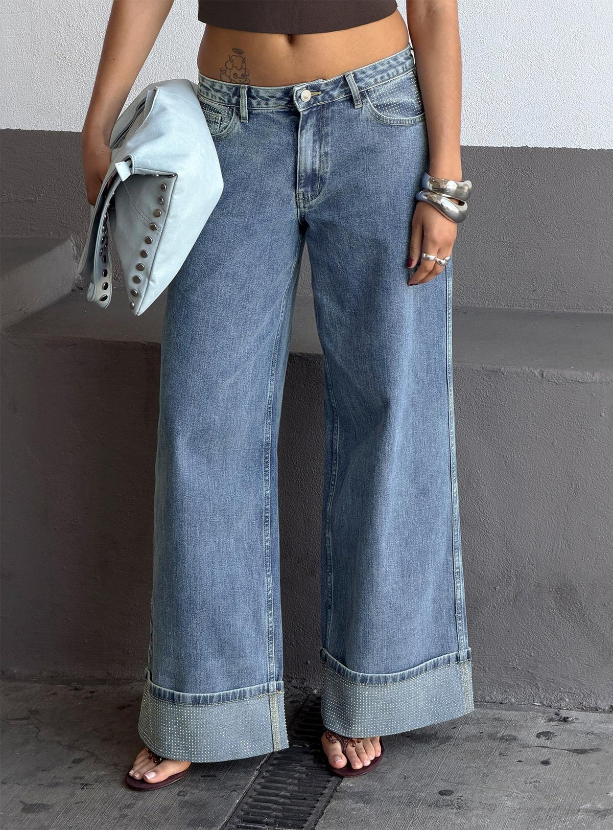 side view of model wearing Princess Polly Ramos Diamante Low Rise Wide Leg Jeans Washed Mid Blue Low Rise Jeans Jeans 