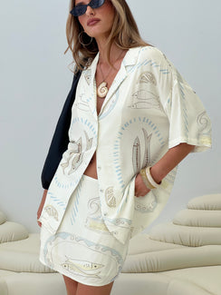 back view of model wearing Princess Polly Caraliia Shirt Cream Half Sleeves V-Neck 