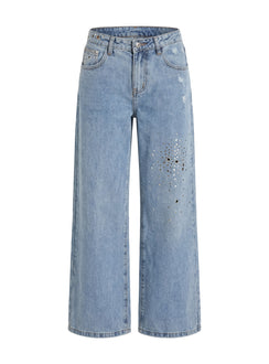 Highlighting Candi Mid Rise Wide Leg Studded Jeans in a light blue wash, womens-jeans with mid-rise waist and belt detail Princess Polly