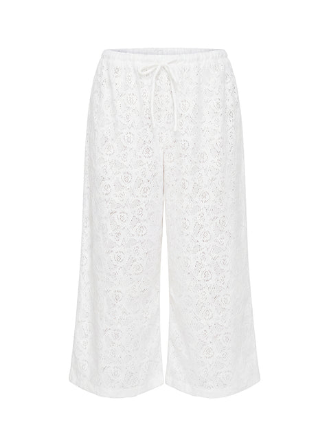Highlighting the Kiss Me Quick 3/4 Lace Drawstring Pants White in womens regular pants with mid-rise waist detail Princess Polly