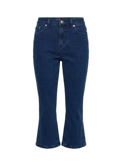 back view of model wearing Princess Polly Kissimo Kick Flare Capri Pants Indigo Blue Mid Rise Jeans Jeans 