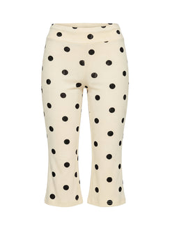 side view of model wearing Princess Polly Samaira Capri Pant Cream Polka Dot Mid Rise Pants Pants 