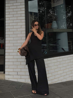 side view of model wearing Princess Polly Emorisa Mid Rise Chiffon Pant Black Mid Rise Pants Pants 
