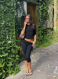 Featuring the Bailor Channel Waistband Capri Pants Black in womens-regular-pants with high-rise and ruched details front view of model wearing Princess Polly