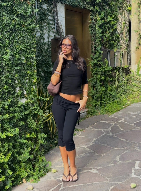 Featuring the Bailor Channel Waistband Capri Pants Black in womens-regular-pants with high-rise and ruched details front view of model wearing Princess Polly